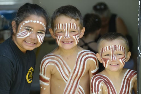 Children in traditional paint